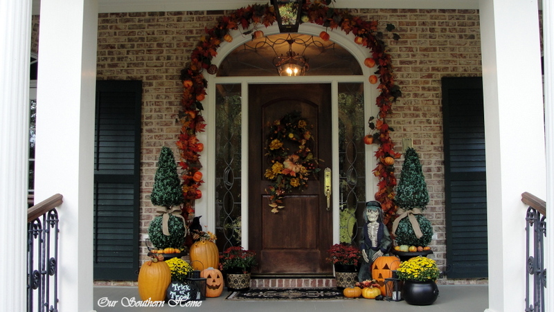 front porch decorated for fall