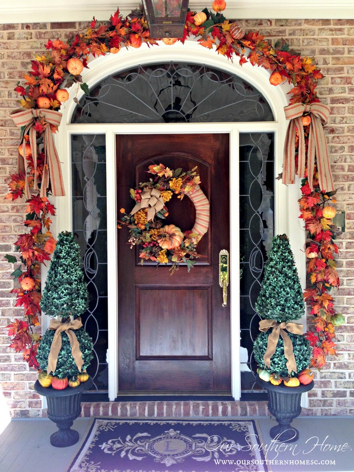 fall front door with wreath, ribbon and garland