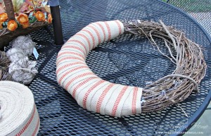 See how I took apart my old fall wreath that was in need of freshening up! I reused it to create a newup to date look for our Fall front entrance. Visit Our Southern Home for the details! #fall #falldecor #fallwreath