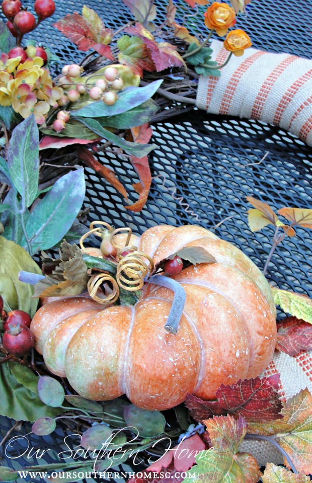 grapevine wreath with pumpkins and fall florals