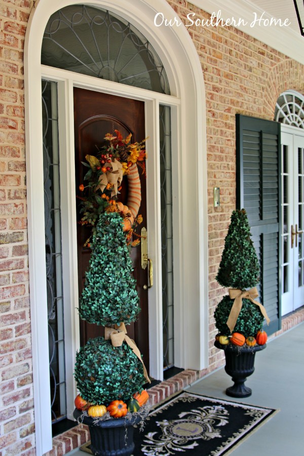 Southern fall porch decked for the harvest season by Our Southern Home