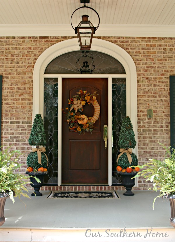 Southern fall porch decked for the harvest season by Our Southern Home