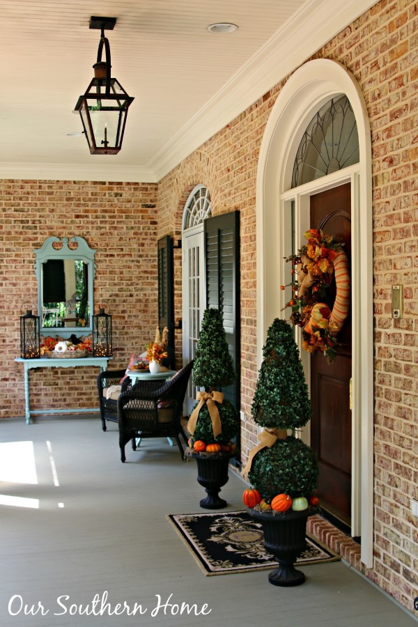 Southern fall porch decked for the harvest season by Our Southern Home