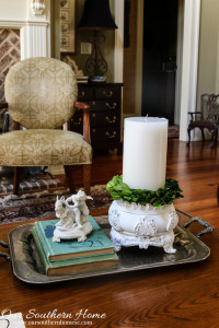 Wow! A little spray paint can completely transform a home decor piece. Now it so fits into a French Farmhouse style!