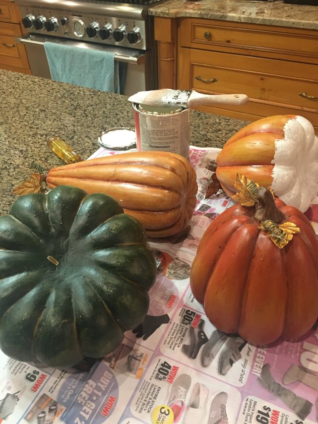 Make over old faded thrift store faux pumpkins with paint for a fresh new look!