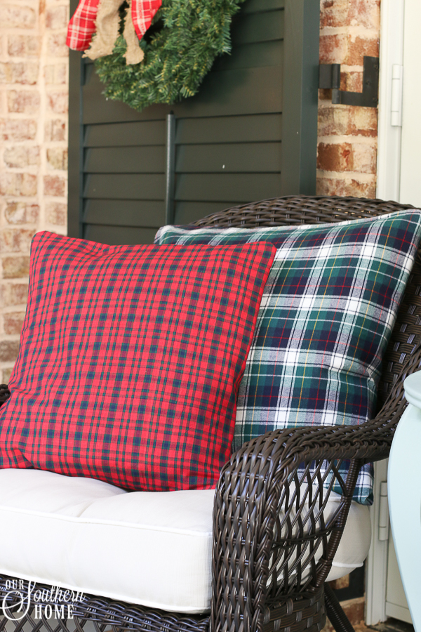 5 minute porch pillow makeover turns those summer pillows into Christmas magic with little effort!