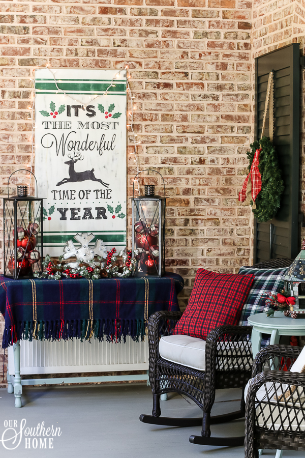 5 minute porch pillow makeover turns those summer pillows into Christmas magic with little effort!