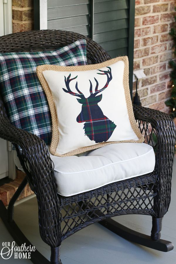 5 minute porch pillow makeover turns those summer pillows into Christmas magic with little effort!