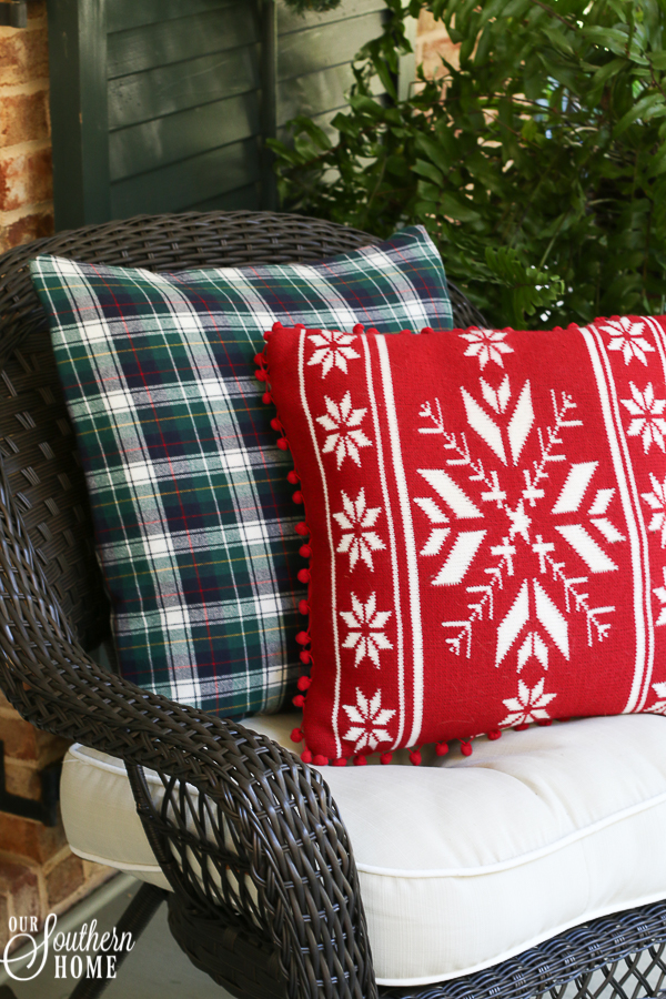 5 minute porch pillow makeover turns those summer pillows into Christmas magic with little effort!