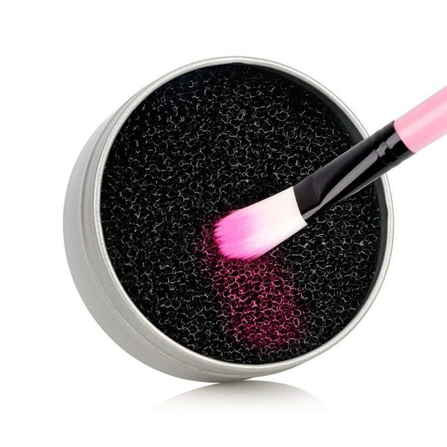 black sponge and makeup brush