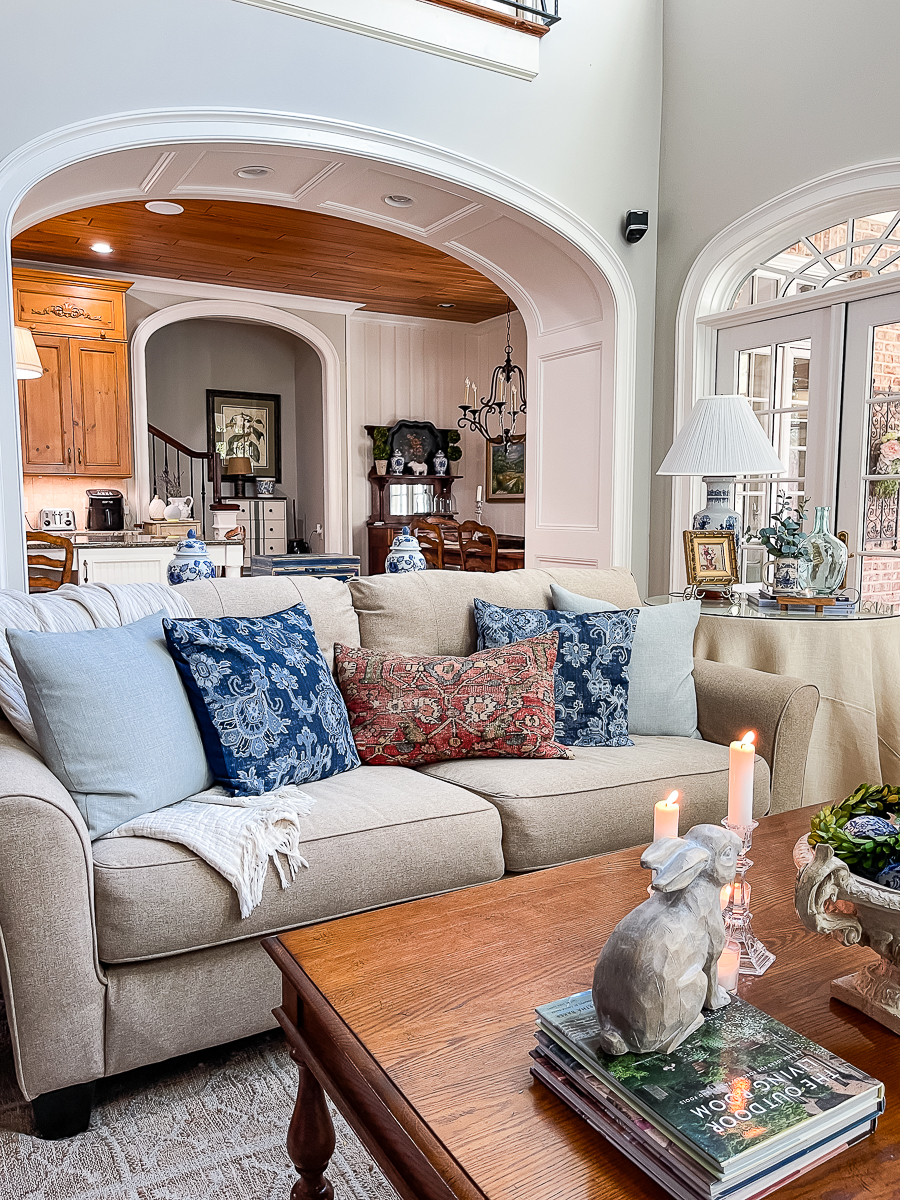 neutral family room with blue and white