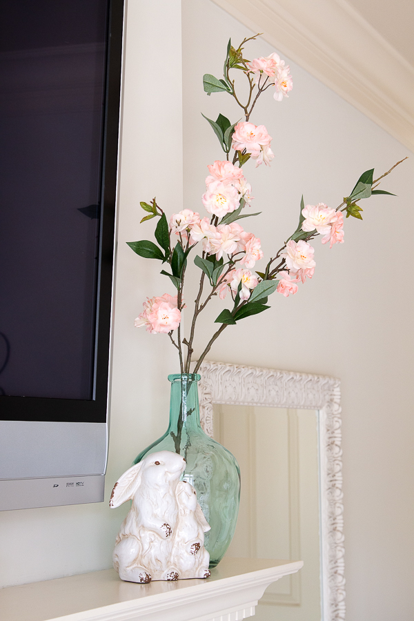 vase with flowers and rabbit