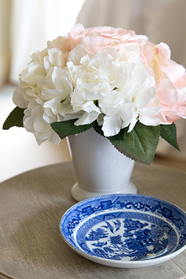 florals with blue and white plate