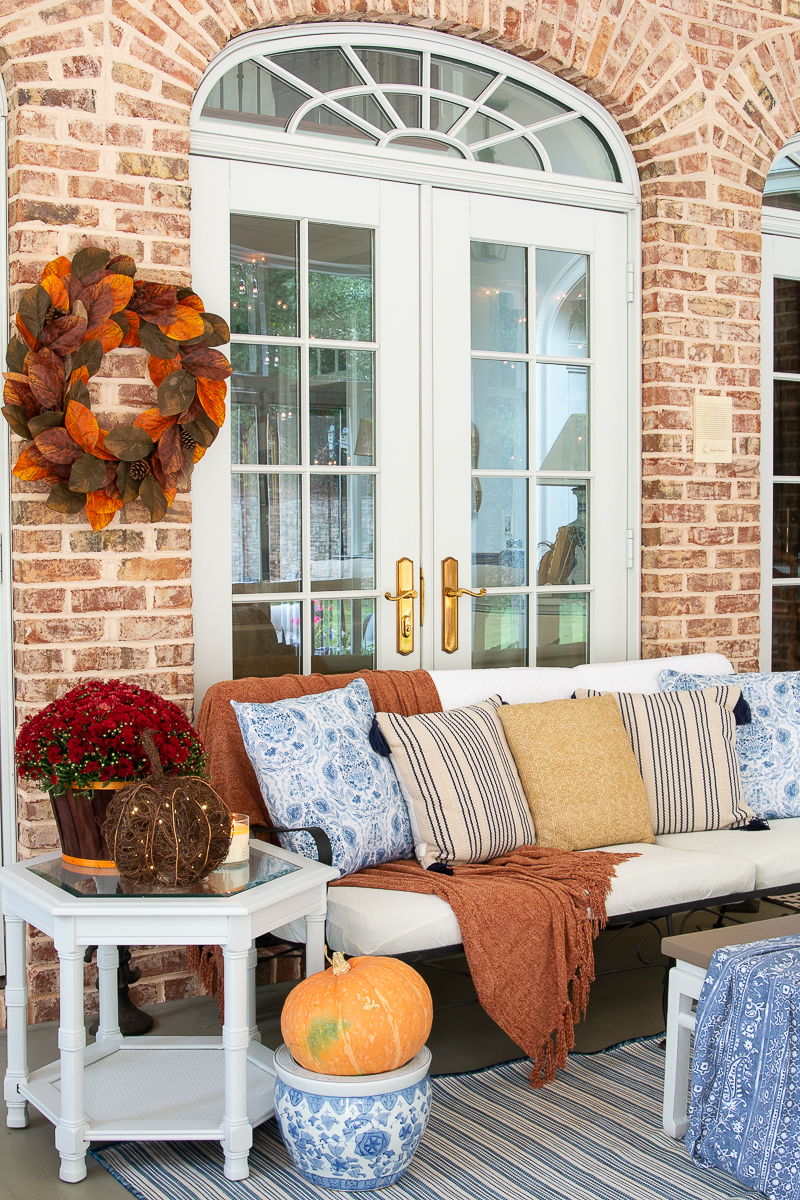 fall porch with blues and reds
