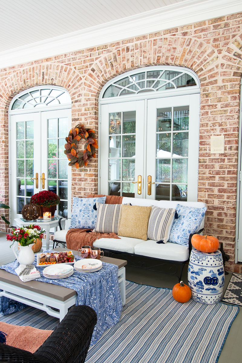 fall porch with blues, rusts and orange
