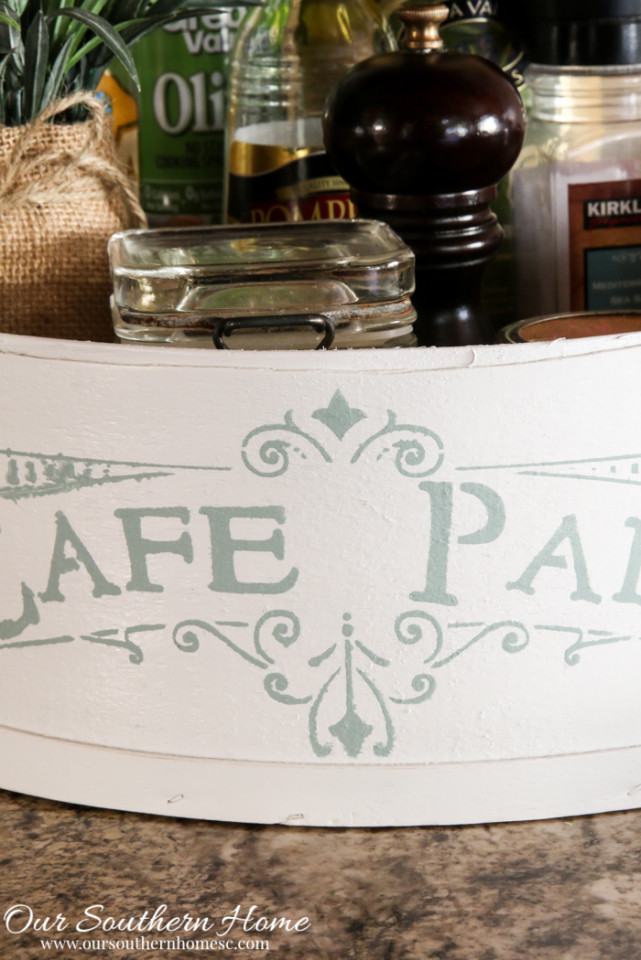 Hoop cheese box is transformed into a French Country farmhouse styled kitchen caddy.