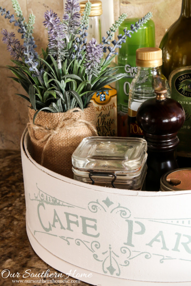 Hoop cheese box is transformed into a French Country farmhouse styled kitchen caddy.