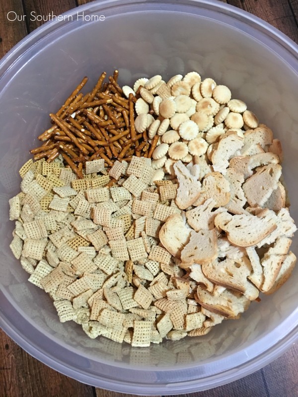 Combine your Chex cereal, melba toast, oyster crackers and pretzels via Our Southern Home for your Chex Party Mix recipe #ad 