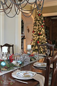 Christmas dining room using blues along with traditional reds by Our Southern Home