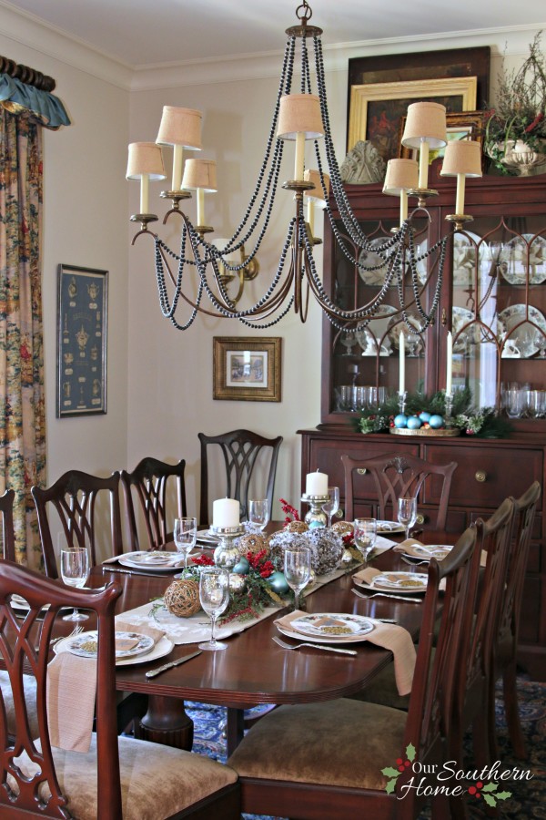 Christmas dining room using blues along with traditional reds by Our Southern Home