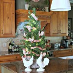 Thrift store basket becomes kitchen counter Christmas tree basket with a simple paint technique.