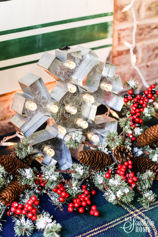 Southern Porch tour full of ideas with plaids and more! #christmas #christmasporch #christmasdecor