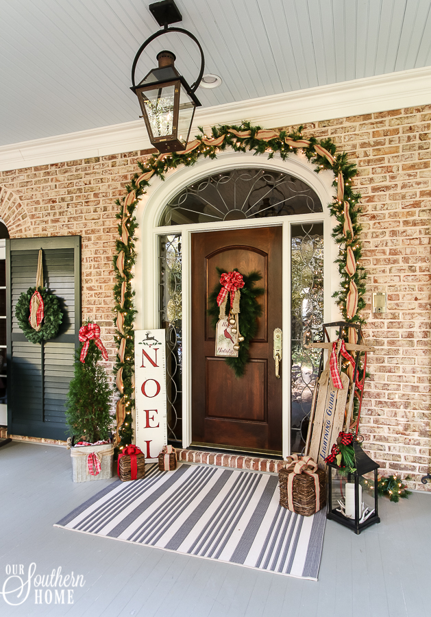 Southern Porch tour full of ideas with plaids and more! #christmas #christmasporch #christmasdecor