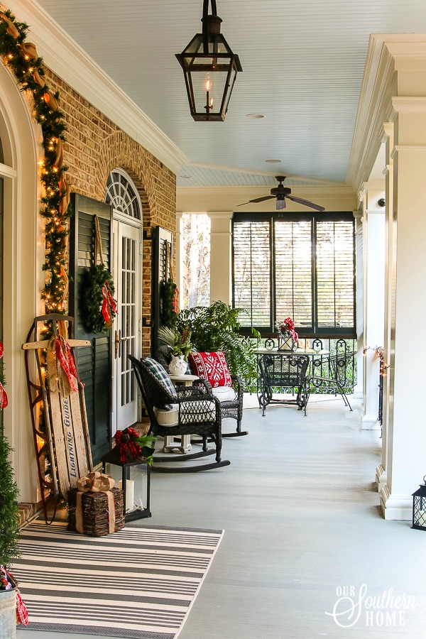 Southern Porch tour full of ideas with plaids and more! #christmas #christmasporch #christmasdecor