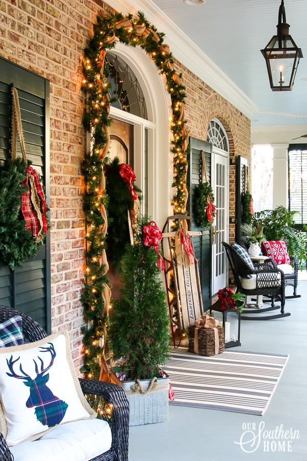 Southern Porch tour full of ideas with plaids and more! #christmas #christmasporch #christmasdecor