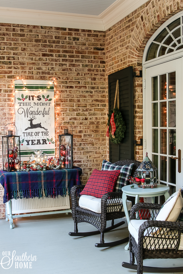 Southern Porch tour full of ideas with plaids and more! #christmas #christmasporch #christmasdecor