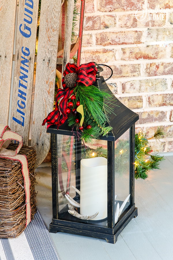 Southern Porch tour full of ideas with plaids and more! #christmas #christmasporch #christmasdecor