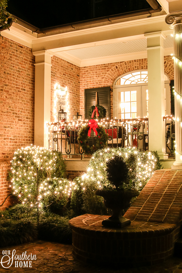 Southern Porch tour full of ideas with plaids and more! #christmas #christmasporch #christmasdecor