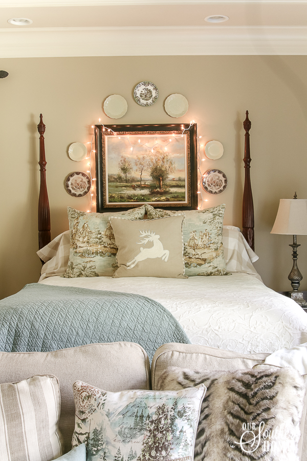 Romantic master bedroom decked for Christmas with neutral decor for an unexpected look! #christmasbedroom #christmasdecor #christmas