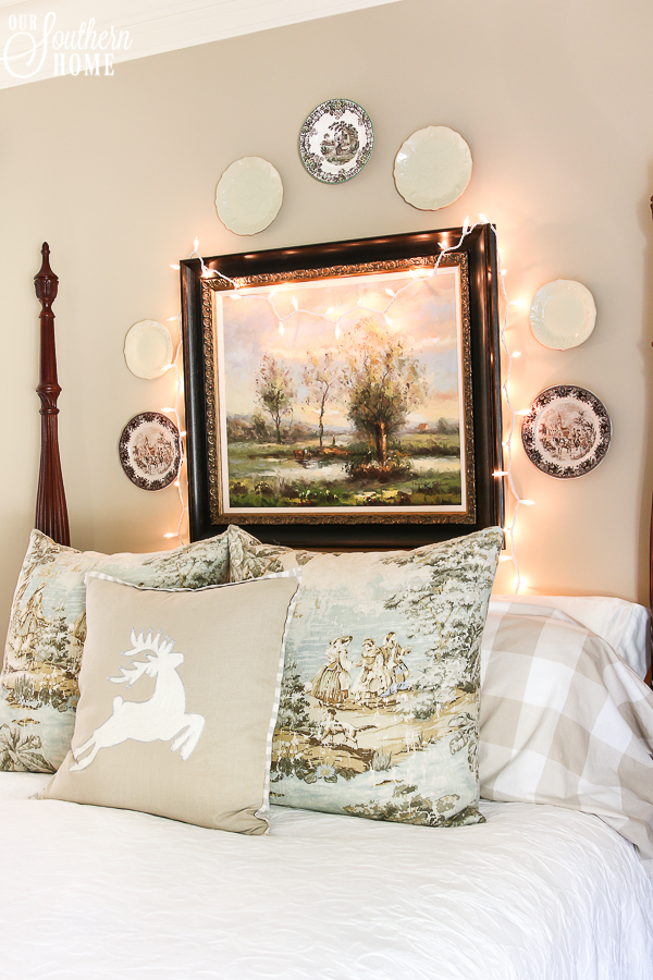 Romantic master bedroom decked for Christmas with neutral decor for an unexpected look! #christmasbedroom #christmasdecor #christmas