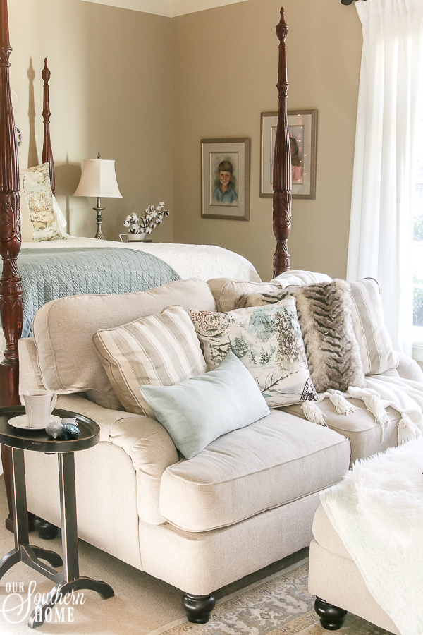 Romantic master bedroom decked for Christmas with neutral decor for an unexpected look! #christmasbedroom #christmasdecor #christmas