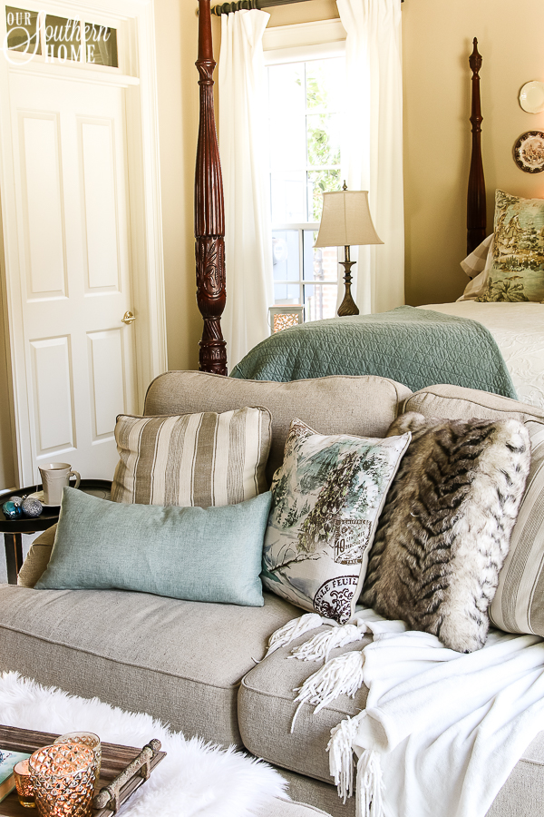 Romantic master bedroom decked for Christmas with neutral decor for an unexpected look! #christmasbedroom #christmasdecor #christmas