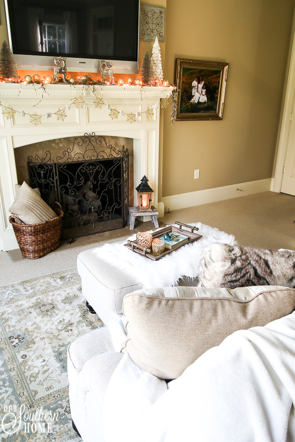 Romantic master bedroom decked for Christmas with neutral decor for an unexpected look! #christmasbedroom #christmasdecor #christmas