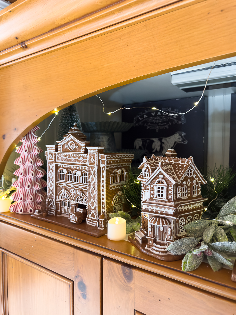 gingerbread houses in cabinet