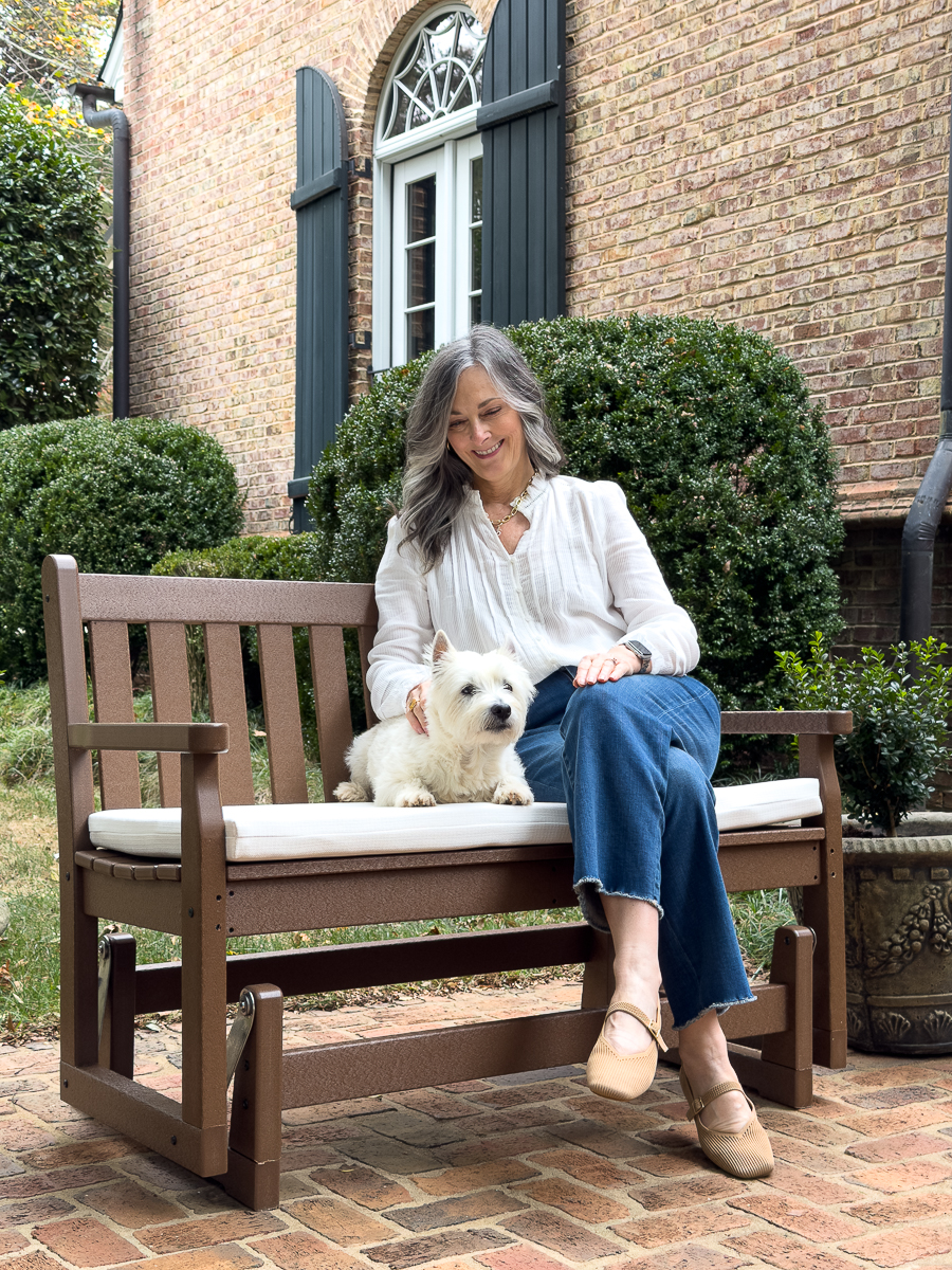 Christy and Bentley sitting on POLYWOOD glider
