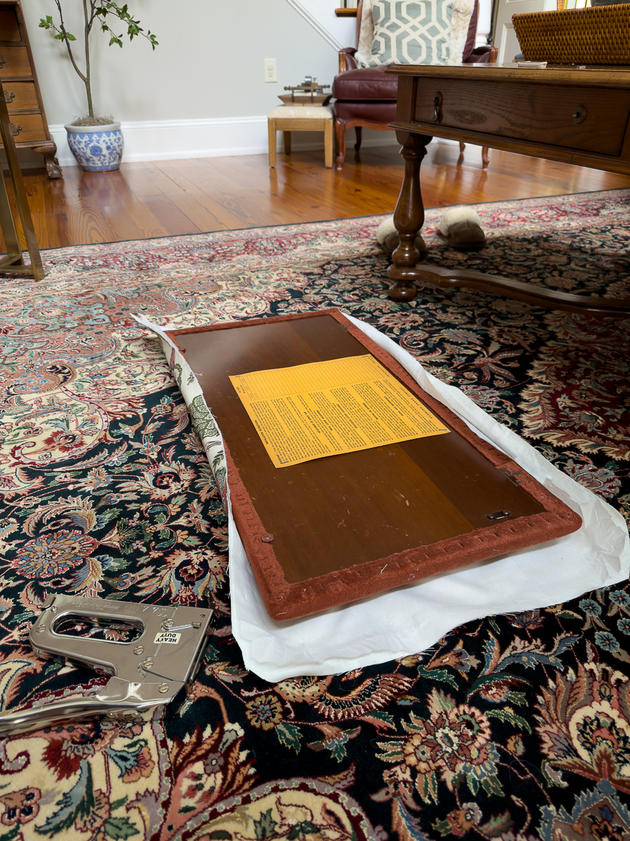 stapling floral fabric to piano bench seat