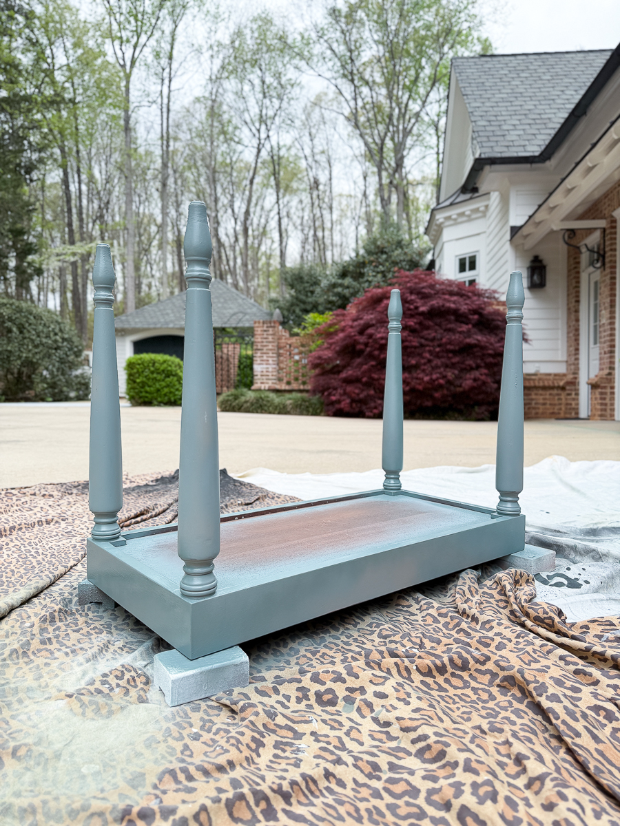 spray painting piano bench base sage green