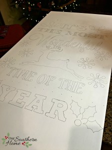It's the most wonderful time of the year vintage look hand-painted DIY Christmas sign by Our Southern Home. This is much easier that you think! You've got to check it out! #homeforchristmas
