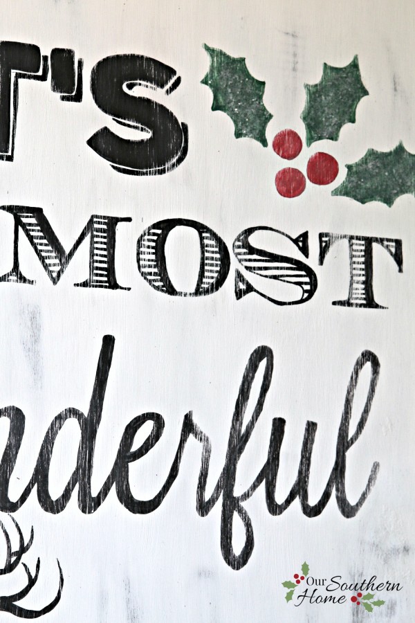 It's the most wonderful time of the year vintage look hand-painted DIY Christmas sign by Our Southern Home. This is much easier that you think! You've got to check it out! #homeforchristmas