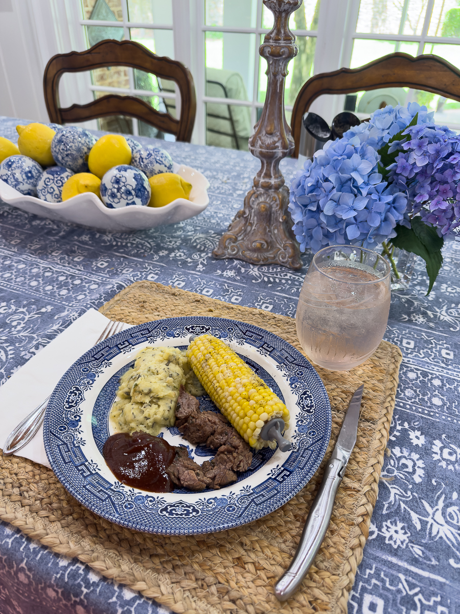 steak, potatoes and fresh corn