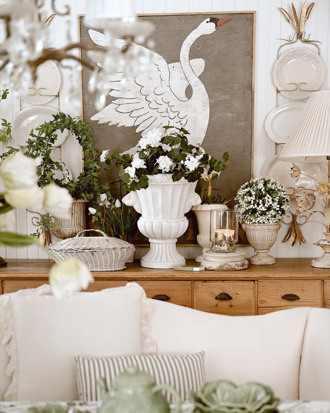 spring vignette with urns and white flowers