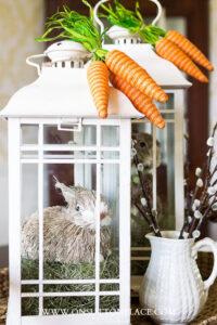 rabbit in a lantern with faux carrots