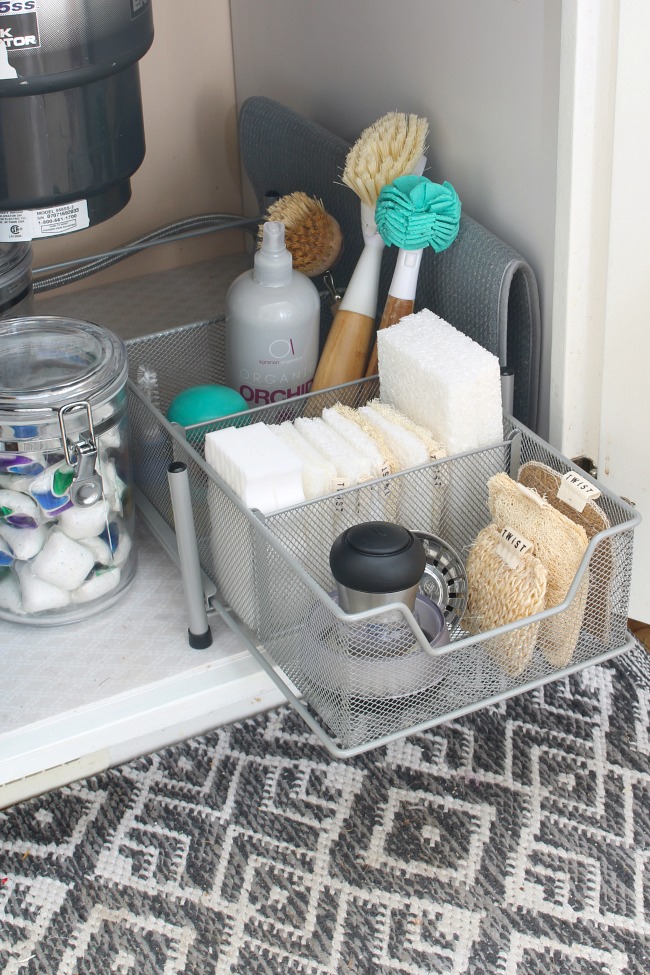 organized under the kitchen sink