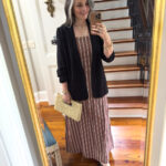 woman in stripe dress and blazer