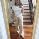 woman in linen pants and white tee