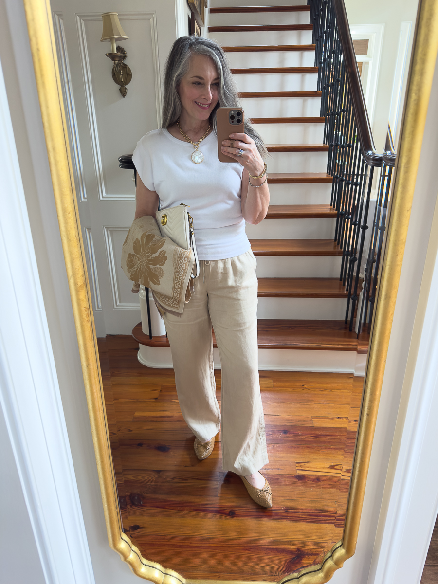 woman in linen pants and white tee